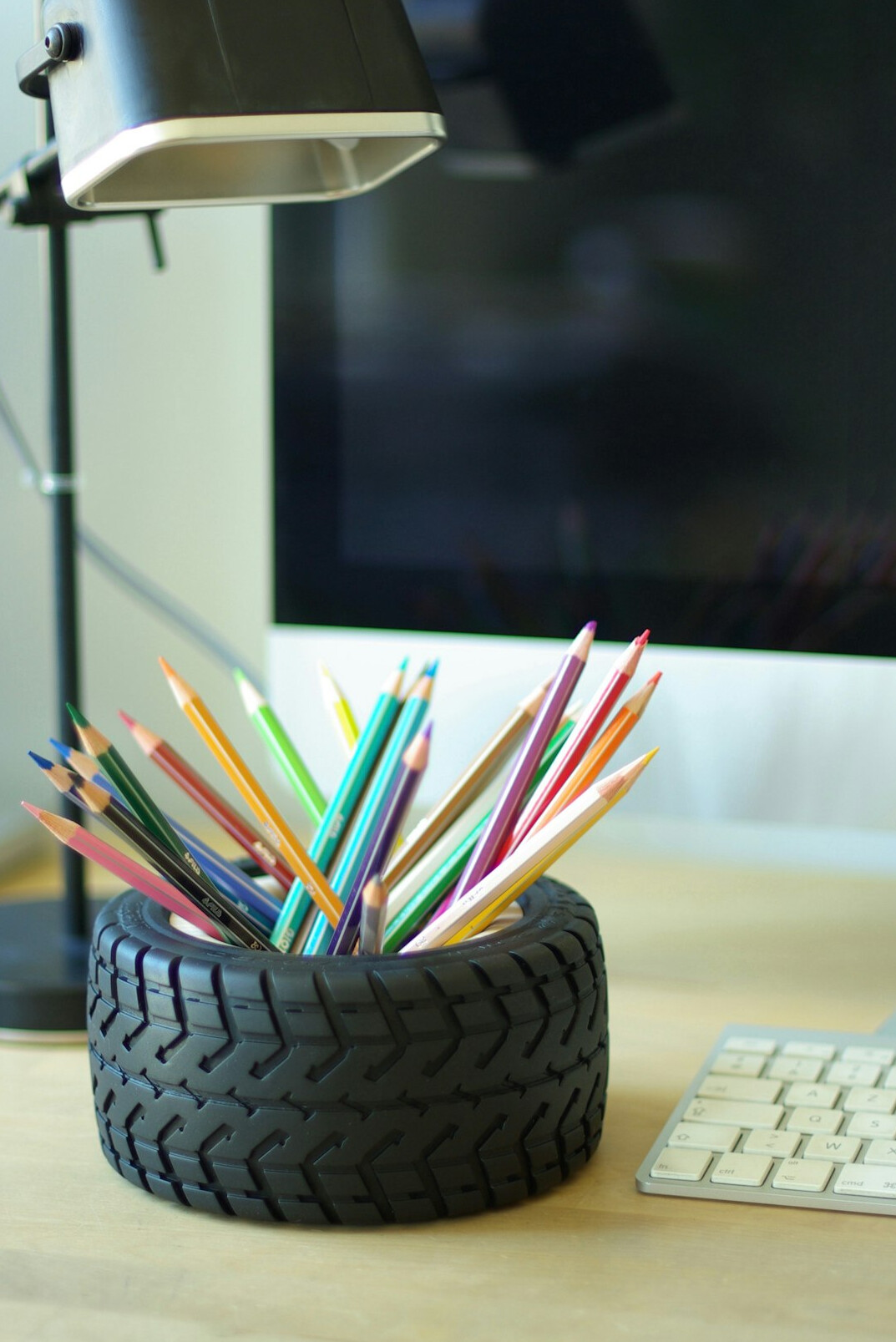 Elegant editorial office space with automotive photography on the walls