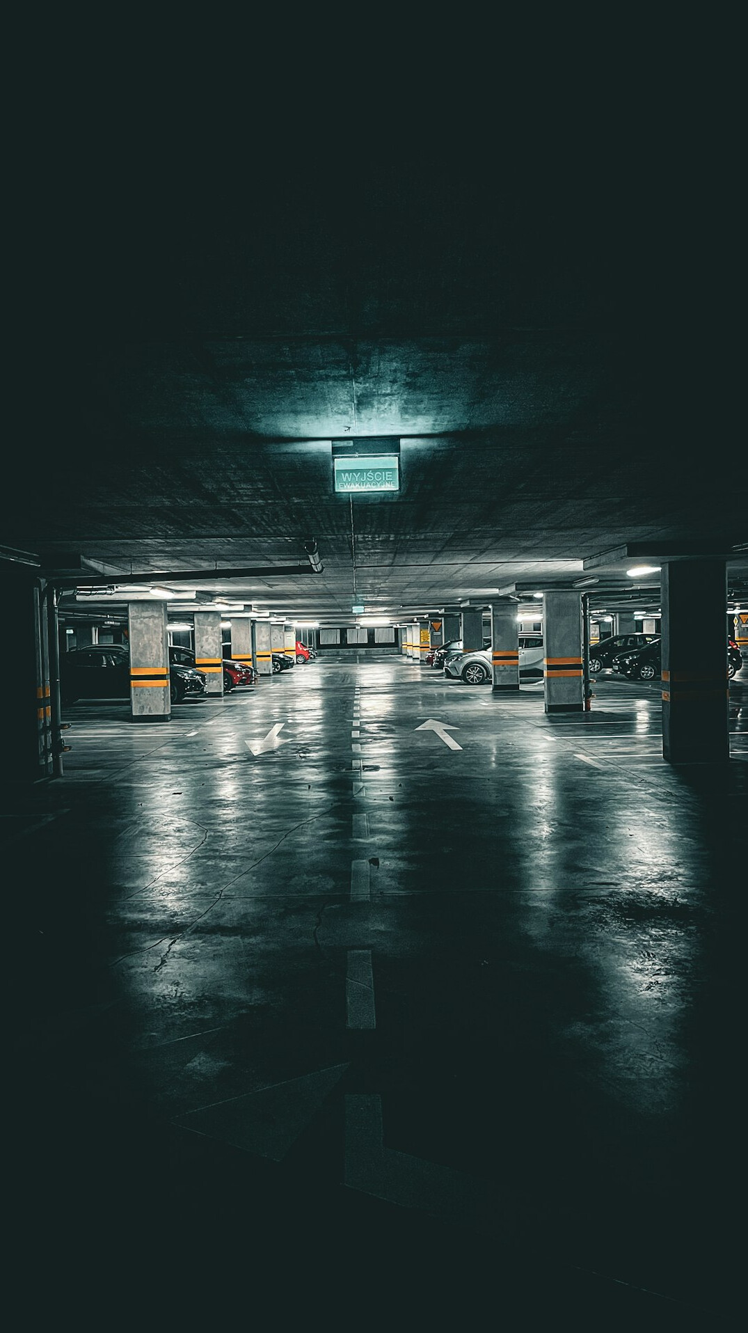 Legendary supercar parked in an empty underground parking structure
